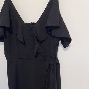 Medium short black dress with ruffles by Blue Blush